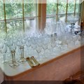 G15. Glass and crystal stemware and serving vessels. 